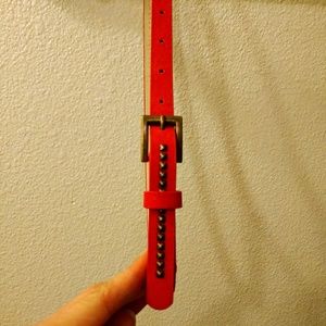 Coral studded skinny belt